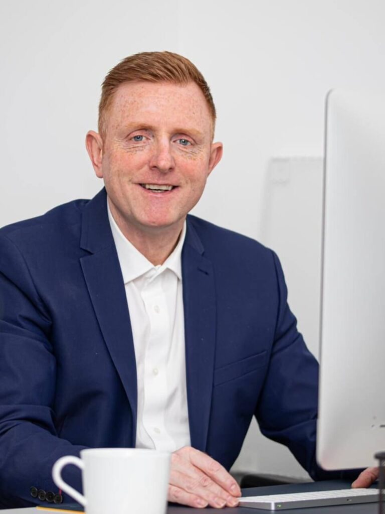 4ghz4KQWYD0 Businessman home working with a Computer, desk and chair.