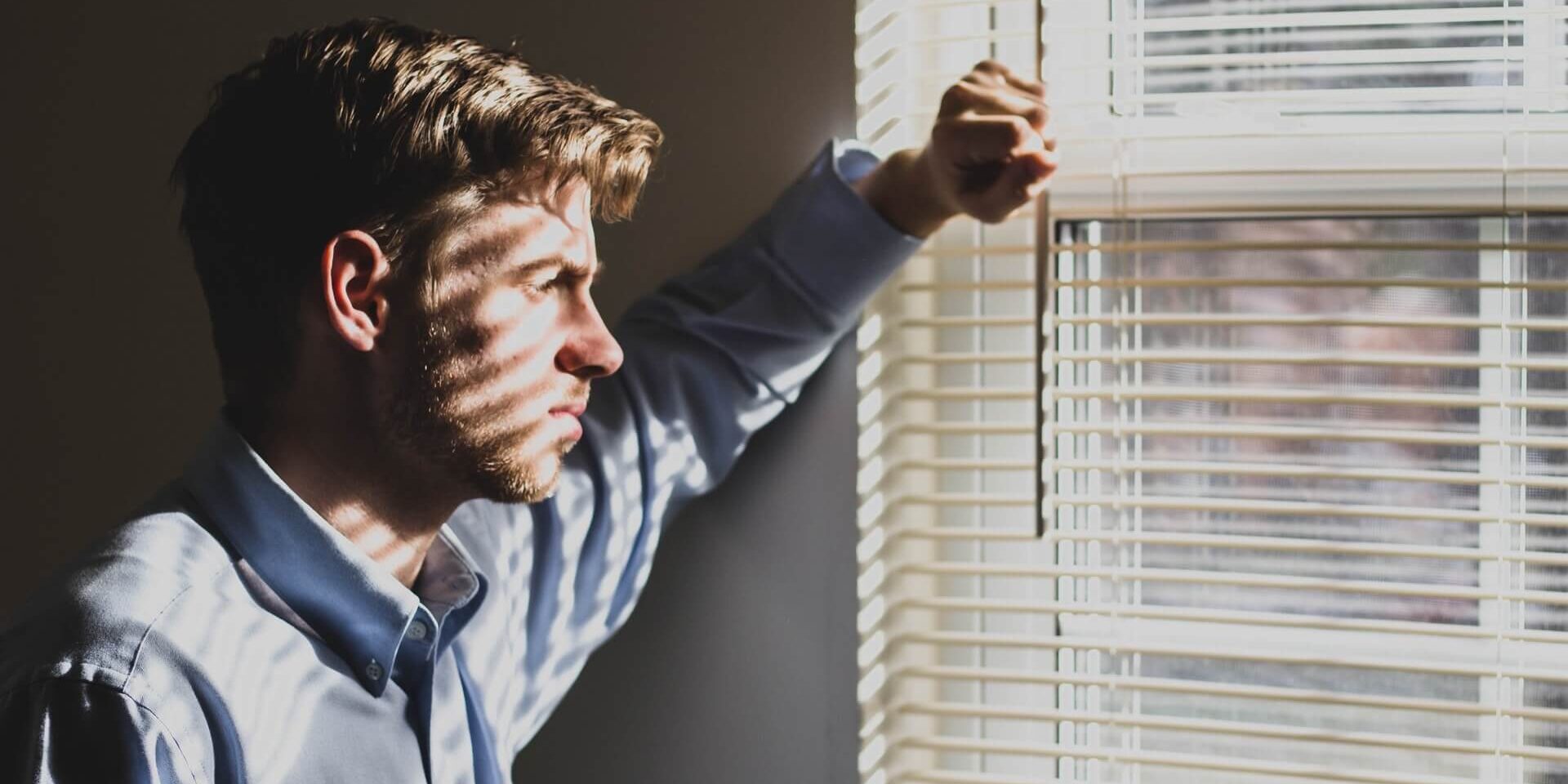 a man looking outside