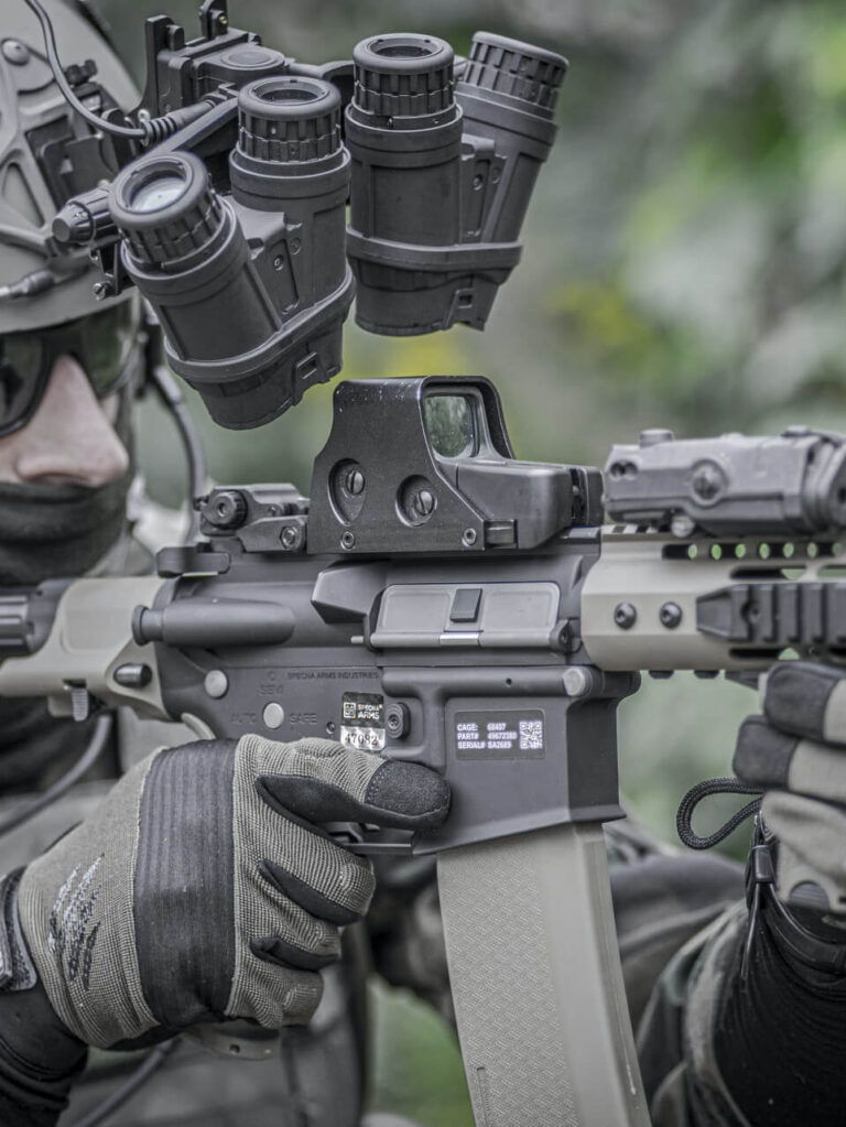 The Way Out Military man, army, soldier in tactical uniform with carbine and tactical gloves